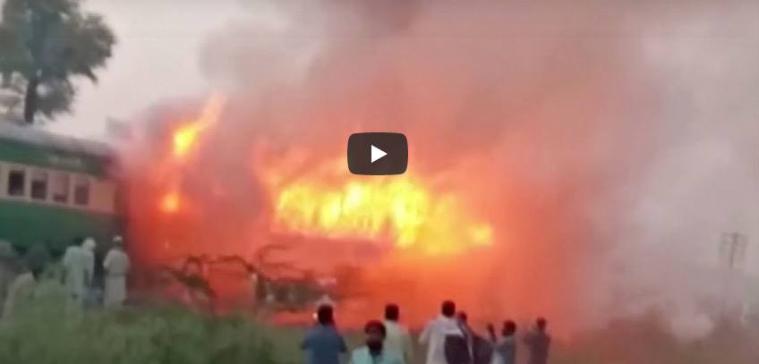 Fire on moving train killing dozens of passengers in central Pakistan